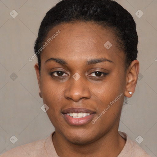 Joyful black young-adult female with short  black hair and brown eyes