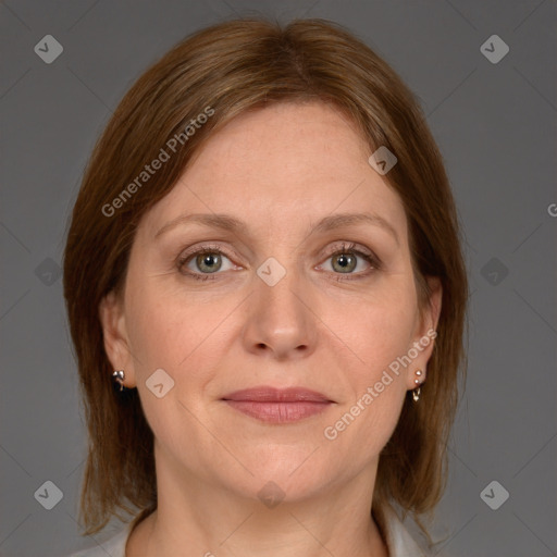 Joyful white adult female with medium  brown hair and grey eyes