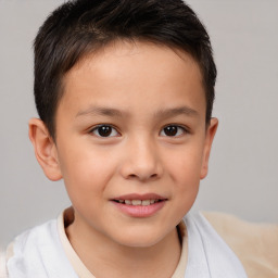 Joyful white child male with short  brown hair and brown eyes