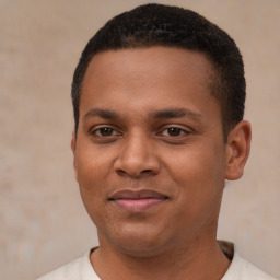 Joyful latino young-adult male with short  brown hair and brown eyes