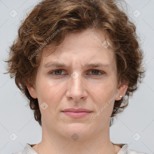 Joyful white young-adult female with medium  brown hair and green eyes