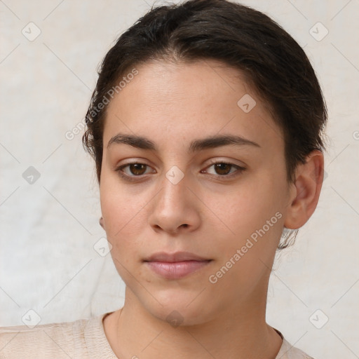 Neutral white young-adult female with short  brown hair and brown eyes