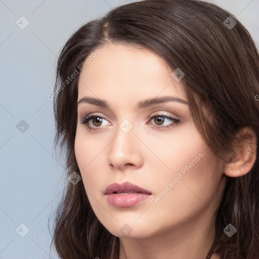 Neutral white young-adult female with long  brown hair and brown eyes