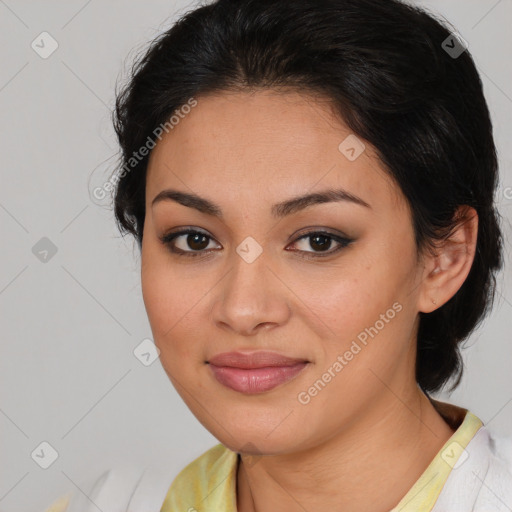 Joyful latino young-adult female with medium  brown hair and brown eyes