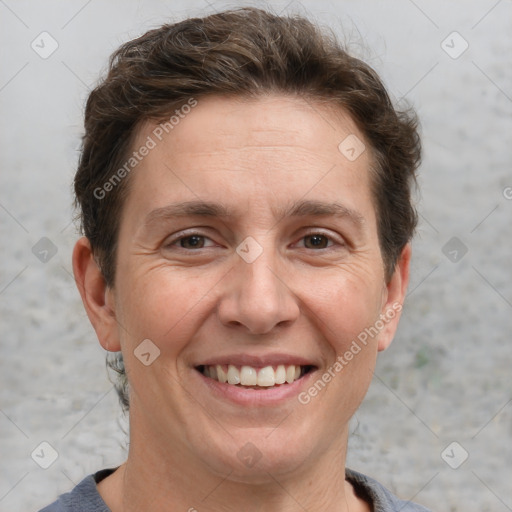 Joyful white adult female with short  brown hair and brown eyes