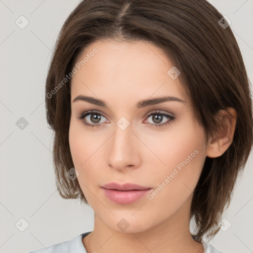 Neutral white young-adult female with medium  brown hair and brown eyes