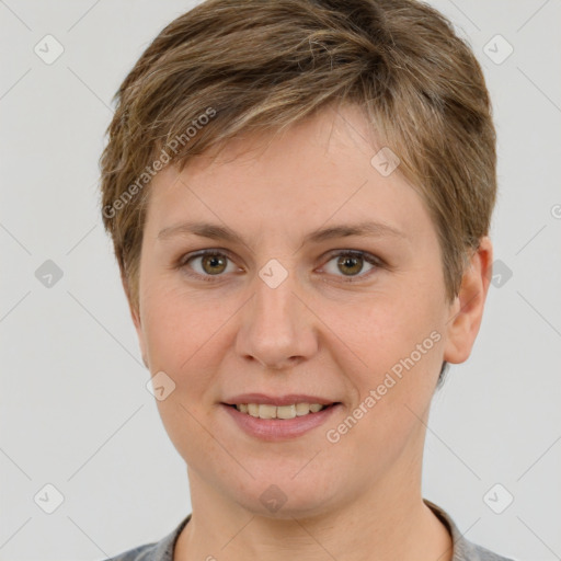 Joyful white young-adult female with short  brown hair and grey eyes