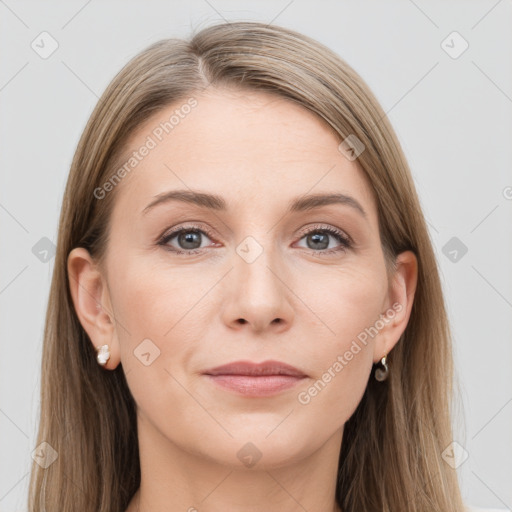 Joyful white young-adult female with long  brown hair and grey eyes