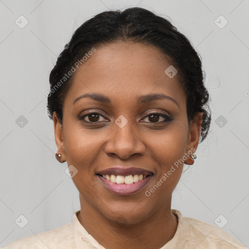 Joyful black young-adult female with short  brown hair and brown eyes