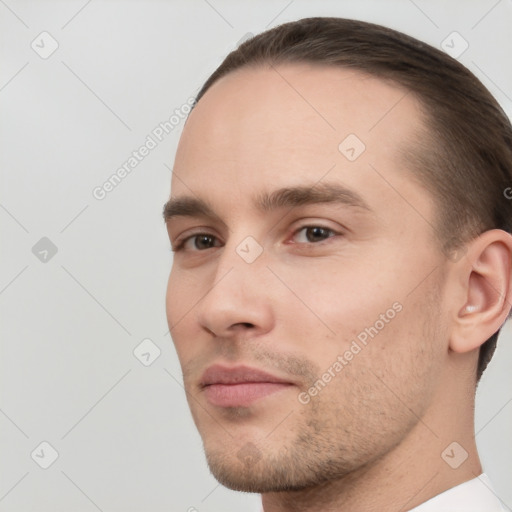 Neutral white young-adult male with short  brown hair and brown eyes