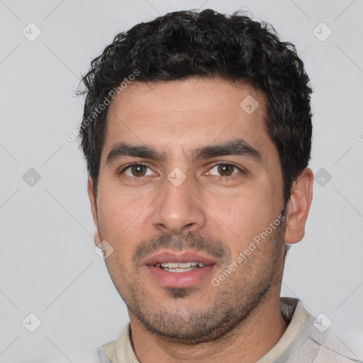 Neutral white young-adult male with short  black hair and brown eyes