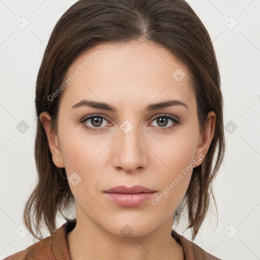 Neutral white young-adult female with medium  brown hair and brown eyes