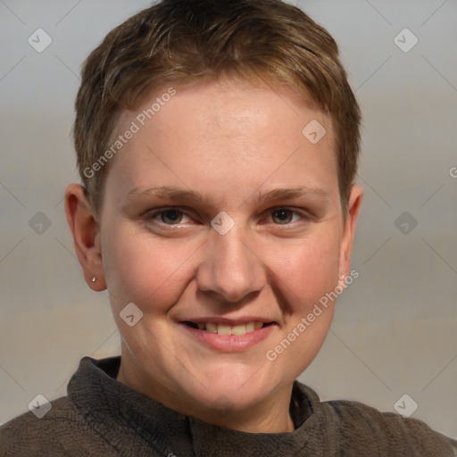 Joyful white young-adult female with short  brown hair and blue eyes