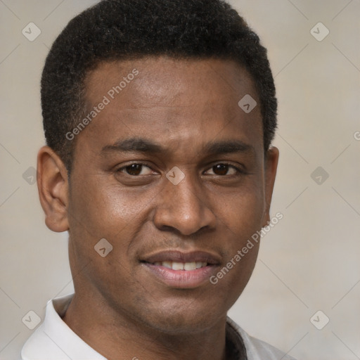 Joyful latino young-adult male with short  brown hair and brown eyes