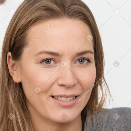 Joyful white young-adult female with long  brown hair and grey eyes