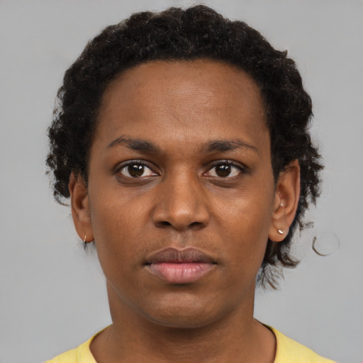 Neutral black young-adult female with short  brown hair and brown eyes