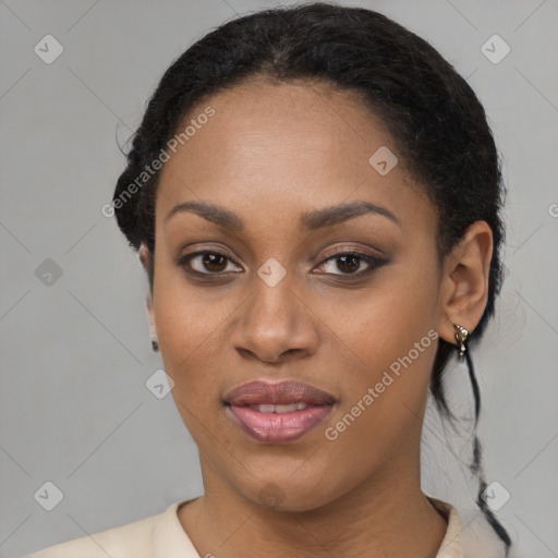 Joyful black young-adult female with medium  brown hair and brown eyes