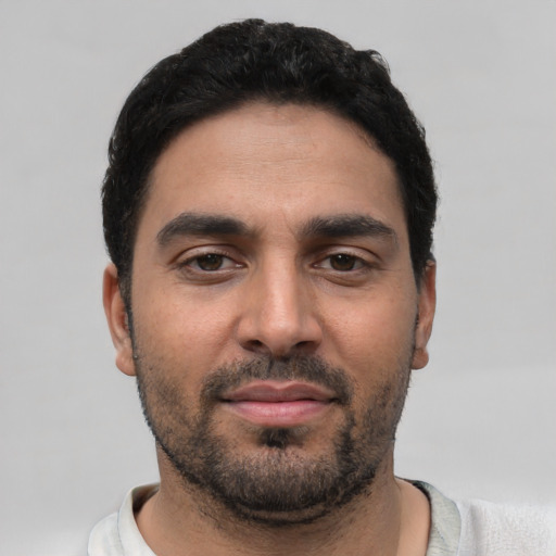Neutral white young-adult male with short  black hair and brown eyes
