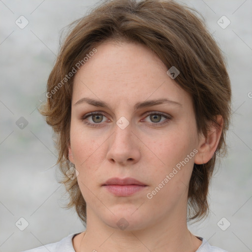 Neutral white young-adult female with medium  brown hair and brown eyes