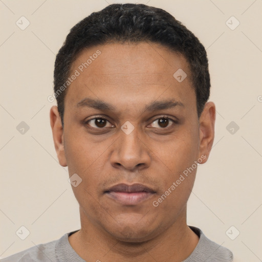 Neutral latino young-adult male with short  black hair and brown eyes