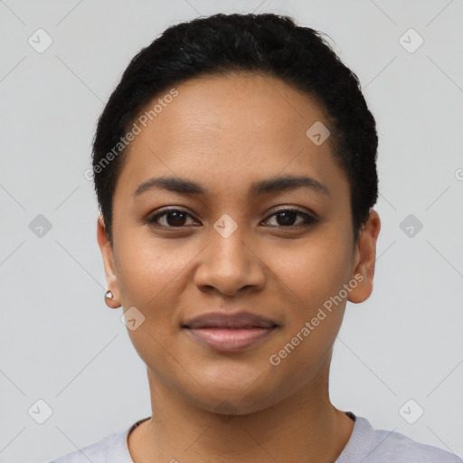 Joyful latino young-adult female with short  black hair and brown eyes