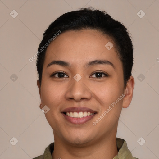 Joyful latino young-adult female with short  brown hair and brown eyes