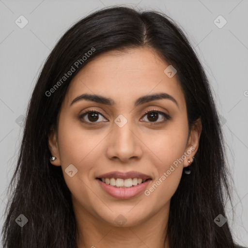 Joyful latino young-adult female with long  brown hair and brown eyes