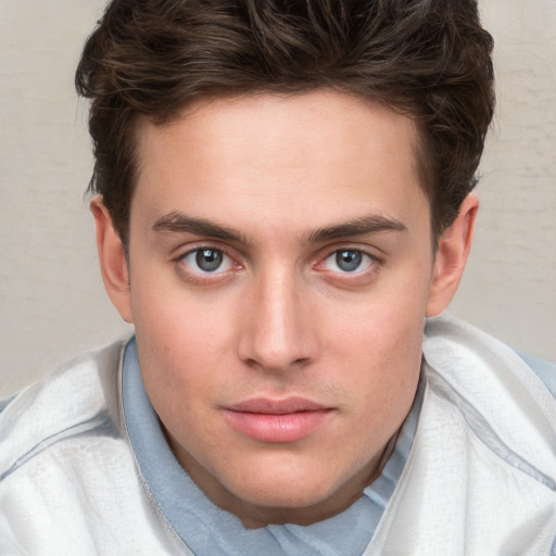 Neutral white young-adult male with short  brown hair and blue eyes