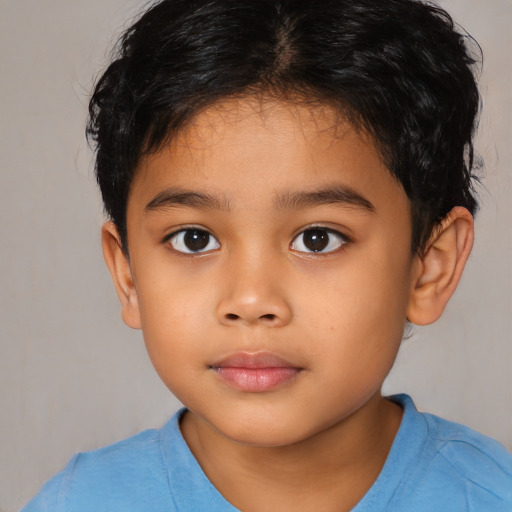 Neutral latino child male with short  brown hair and brown eyes