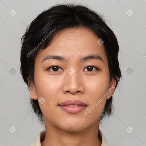 Joyful asian young-adult female with medium  black hair and brown eyes