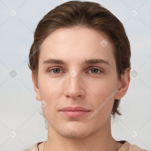 Joyful white young-adult female with short  brown hair and grey eyes