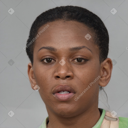 Neutral black young-adult female with short  brown hair and brown eyes