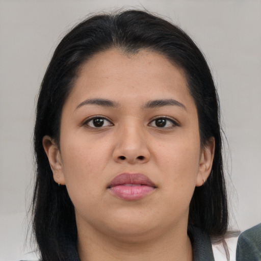 Neutral asian young-adult female with medium  brown hair and brown eyes