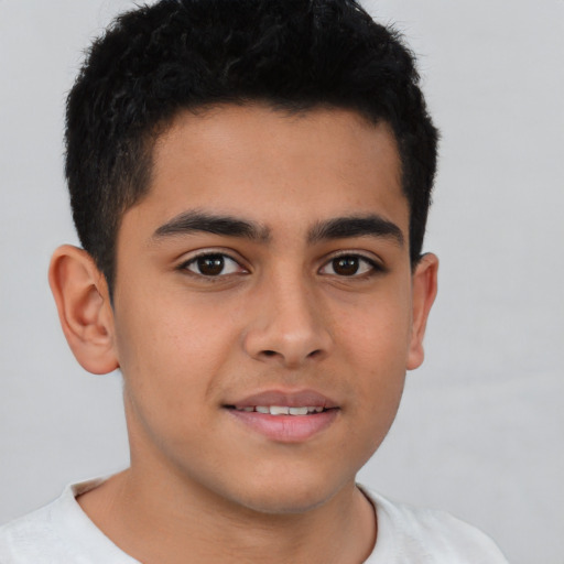 Joyful latino young-adult male with short  brown hair and brown eyes