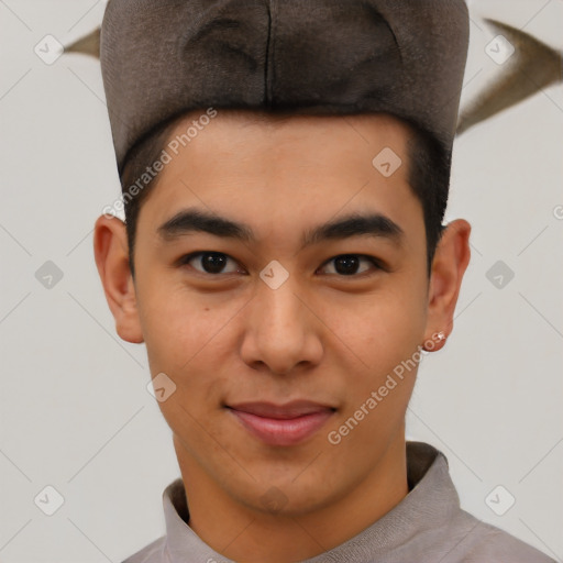 Joyful latino young-adult male with short  brown hair and brown eyes