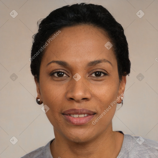 Joyful latino young-adult female with short  black hair and brown eyes