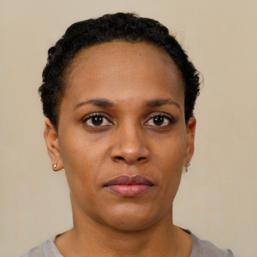 Neutral black young-adult female with short  brown hair and brown eyes