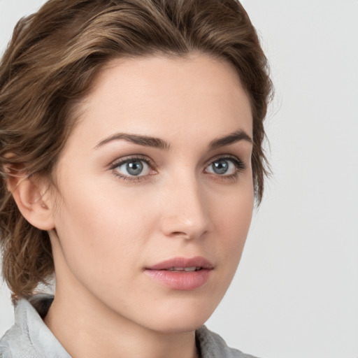 Neutral white young-adult female with medium  brown hair and grey eyes