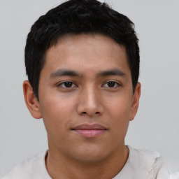 Neutral asian young-adult male with short  brown hair and brown eyes