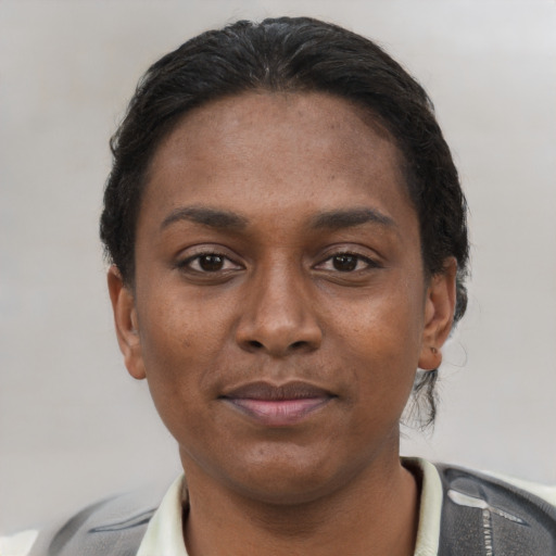 Neutral latino young-adult female with short  black hair and brown eyes