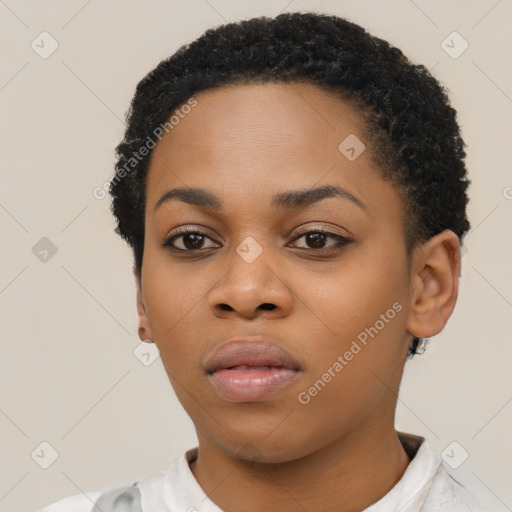 Neutral black young-adult female with short  black hair and brown eyes