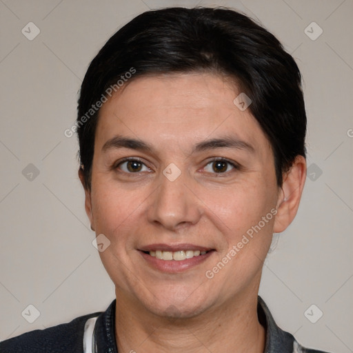 Joyful white adult female with short  brown hair and brown eyes