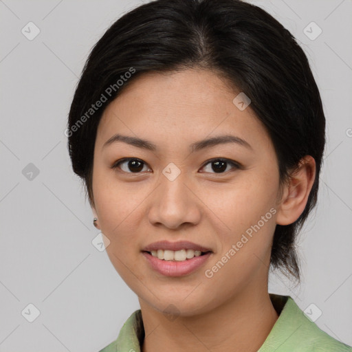 Joyful asian young-adult female with medium  brown hair and brown eyes