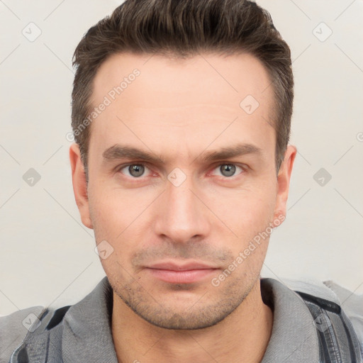 Neutral white young-adult male with short  brown hair and grey eyes