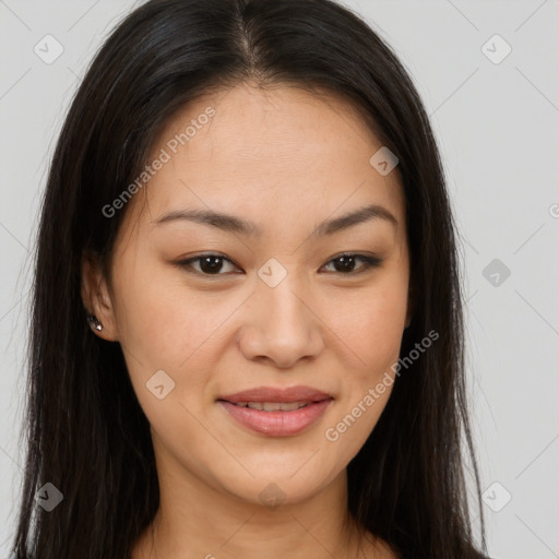 Joyful asian young-adult female with long  brown hair and brown eyes