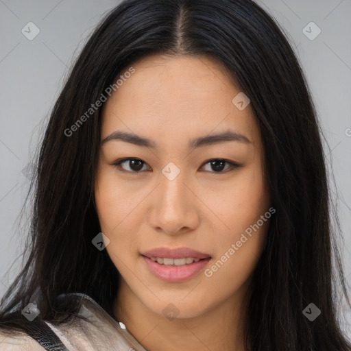 Joyful asian young-adult female with long  brown hair and brown eyes