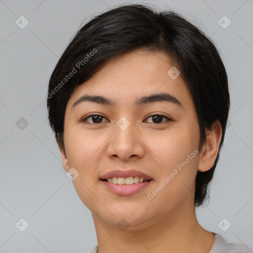 Joyful asian young-adult female with medium  black hair and brown eyes