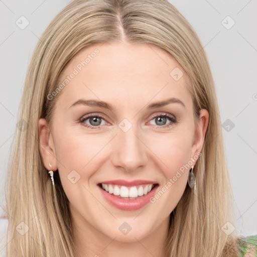 Joyful white young-adult female with long  brown hair and blue eyes