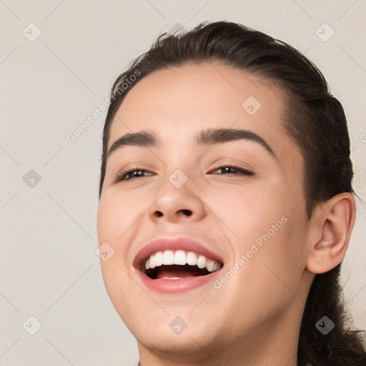 Joyful white young-adult female with medium  brown hair and brown eyes