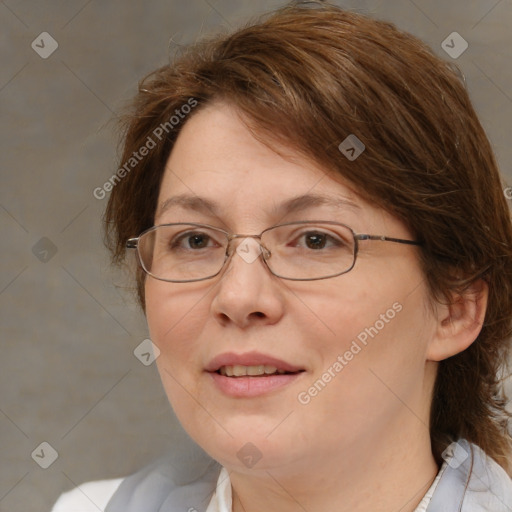 Joyful white adult female with medium  brown hair and blue eyes